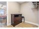 Neatly organized closet with shelving and wooden floors, located by the bedroom at 19418 Gulf Blvd # 507, Indian Shores, FL 33785