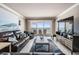 Living room featuring a large ocean view window and comfortable furnishings at 19418 Gulf Blvd # 507, Indian Shores, FL 33785