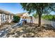 Fenced backyard with mature trees and a swing set, perfect for outdoor fun at 19610 Sunset Bay Dr, Land O Lakes, FL 34638