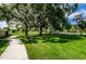 Beautiful community park offers walking paths, shade and plenty of open green space at 19610 Sunset Bay Dr, Land O Lakes, FL 34638