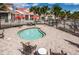 Relaxing community kiddie pool area with comfortable seating and shade umbrellas, perfect for families and young children at 19610 Sunset Bay Dr, Land O Lakes, FL 34638