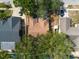 Aerial view of a property showcasing its roof and surrounding residential neighborhood at 3039 Sean Way, Palm Harbor, FL 34684