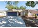 Charming single-story home featuring a two-car garage and well-maintained landscaping at 3039 Sean Way, Palm Harbor, FL 34684
