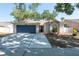 Charming single-story home featuring a two-car garage and well-maintained landscaping at 3039 Sean Way, Palm Harbor, FL 34684