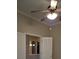 Bedroom view showcasing ceiling fan, neutral paint, and an open doorway at 30434 Colehaven Ct, Wesley Chapel, FL 33543