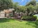 Charming single-Gathering home with a well-maintained lawn and mature trees on a sunny day at 30434 Colehaven Ct, Wesley Chapel, FL 33543