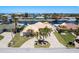 Aerial view of waterfront home, beautiful landscaping, and waterway access in a desirable neighborhood at 3235 Seaway Dr, New Port Richey, FL 34652