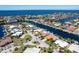 Expansive aerial view of waterfront homes and canals in a vibrant coastal community at 3235 Seaway Dr, New Port Richey, FL 34652