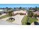 Scenic aerial view of the home showcasing the well-maintained property, waterfront location, and lush landscaping at 3235 Seaway Dr, New Port Richey, FL 34652