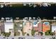 Aerial view displays a community featuring private docks, pools and convenient street access, with waterfront living at its finest at 3235 Seaway Dr, New Port Richey, FL 34652