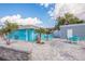 Blue community building with outdoor seating, perfect for gatherings and enjoying the neighborhood amenities at 3235 Seaway Dr, New Port Richey, FL 34652