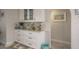 Elegant dining area with built-in cabinetry, marble countertops, and stylish decor, perfect for entertaining guests at 3235 Seaway Dr, New Port Richey, FL 34652
