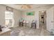 Bright office space with coastal decor, bunny lamps, and views of the hallway at 3235 Seaway Dr, New Port Richey, FL 34652