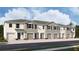 New townhome with attractive facade, garage, complementary colors, and inviting street view at 3516 Marigold Patch Ct, Plant City, FL 33565
