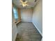 Bright, adaptable room with sleek tile flooring, ready to be personalized as a bedroom, office, or creative area at 37565 Teri Ct, Dade City, FL 33525
