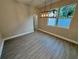 Dining room with modern lighting, tile floors, natural light, and neutral color palette at 37565 Teri Ct, Dade City, FL 33525
