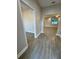 Inviting entryway featuring tile floors and a seamless transition into the home's living spaces with natural light at 37565 Teri Ct, Dade City, FL 33525