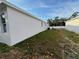 Exterior side view of the house showing yard and house at 37565 Teri Ct, Dade City, FL 33525