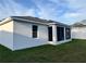 Screened in patio on the rear exterior of the home at 37565 Teri Ct, Dade City, FL 33525