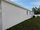 Side view of home showing a well maintained yard at 37565 Teri Ct, Dade City, FL 33525