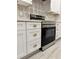 Modern kitchen with stainless steel oven and drawer-style cabinets at 37565 Teri Ct, Dade City, FL 33525