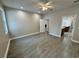 Spacious main bedroom features tile flooring, recessed lighting, and an ensuite bathroom for ultimate convenience at 37565 Teri Ct, Dade City, FL 33525