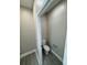 This powder room features gray wood look floor tiles and neutral walls at 37565 Teri Ct, Dade City, FL 33525