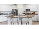 Modern kitchen with stainless steel appliances and marble countertops at 4039 Westwood Fields Loop, Plant City, FL 33565