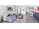 Spacious living room featuring tile flooring, stylish furniture and a tv at 4039 Westwood Fields Loop, Plant City, FL 33565