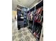 Large walk-in closet with custom organizers, shelving and ample storage space at 4294 Cork Rd, Plant City, FL 33565