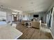 Spacious living room with hardwood floors, lots of natural light, and comfortable seating at 4294 Cork Rd, Plant City, FL 33565