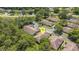 Overhead shot of property within a wooded community, pin location is approximate at 4425 Connery Ct, Palm Harbor, FL 34685