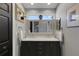 Elegant bathroom with double sinks, framed mirror, vanity, and framed art, offering a functional and stylish space at 4425 Connery Ct, Palm Harbor, FL 34685