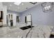 The kitchen boasts granite countertops, updated stainless steel appliances and a kitchen island at 4425 Connery Ct, Palm Harbor, FL 34685