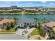 Beautiful waterfront home with lush landscaping and convenient three-car garage at 6202 Pasadena Point Blvd, Gulfport, FL 33707