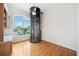 Bonus room with hardwood floors, an in-home elevator and large window with views to the outside at 6202 Pasadena Point Blvd, Gulfport, FL 33707