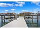 Dock with boat lifts and views of the intercoastal waterway at 6202 Pasadena Point Blvd, Gulfport, FL 33707