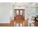 Grand entryway featuring wood double doors and elegant architectural details at 6202 Pasadena Point Blvd, Gulfport, FL 33707