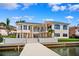 View of a spacious waterfront home featuring a private dock and waterfront access at 6202 Pasadena Point Blvd, Gulfport, FL 33707