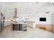 Large kitchen with island, granite countertops, and stainless appliances at 6202 Pasadena Point Blvd, Gulfport, FL 33707
