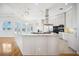 Spacious bright kitchen with a large island, modern appliances, and lots of storage at 6202 Pasadena Point Blvd, Gulfport, FL 33707