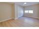 Bright bedroom with natural light, large closet, and hardwood flooring at 6528 Santiago Ct, Apollo Beach, FL 33572