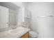 Clean, functional bathroom features a vanity, toilet, and shower at 6831 Dartmouth Hill St, Riverview, FL 33578