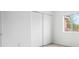 Neat bedroom offering natural light, wood floor, and ample closet space at 6831 Dartmouth Hill St, Riverview, FL 33578