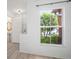 This living room features a lovely view, and a door to a powder room at 6831 Dartmouth Hill St, Riverview, FL 33578