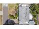 Aerial view of a house showcasing the roof and surrounding trees at 736 85Th N Ave, St Petersburg, FL 33702