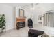Cozy living area with fireplace and access to the bedroom and patio at 736 85Th N Ave, St Petersburg, FL 33702