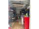 Organized shed interior offers storage solutions, work space, and potential for various hobbies at 736 85Th N Ave, St Petersburg, FL 33702