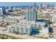 Panoramic aerial view featuring modern high-rise condominiums set against a vibrant cityscape at 912 Channelside Dr # 2710, Tampa, FL 33602