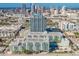 Stunning aerial view showcasing modern condominiums with skyline, highways and waterways at 912 Channelside Dr # 2710, Tampa, FL 33602